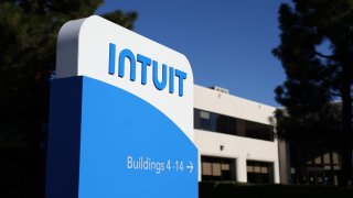 A sign is posted in front of a building at the Intuit headquarters in Mountain View, California, on Nov. 28, 2023.