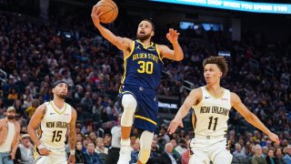 Stephen Curry #30 of the Golden State Warriors drives to the basket in the second quarter against Dyson Daniels #11 of the New Orleans Pelicans at Chase Center on April 12, 2024 in San Francisco, California.