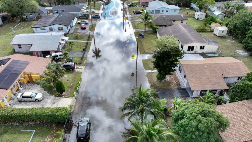 An aerial view of a flooded residential neighborhood street after localized heavy rain on December 18, 2024 in Fort Lauderdale, Florida. 
