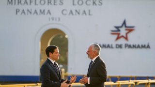 U.S. Secretary of State Marco Rubio (L) talks to Panama Canal Authority Administrator Ricaurte Vasquez during a tour at the Miraflores locks of the Panama Canal in Panama City on February 2, 2025.