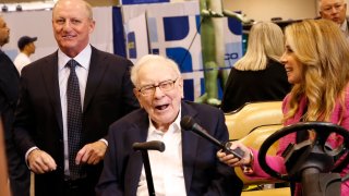 Warren Buffett and Greg Abel walkthrough the Berkshire Hathaway Annual Shareholders Meeting in Omaha, Nebraska on May 3, 2025.
