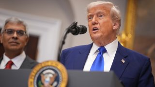 President Donald Trump, joined by National Institutes of Health (NIH) Director Jay Bhattacharya, speaks during a press conference in the Roosevelt Room of the White House on May 12, 2025, in Washington, DC.