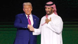 US President Donald Trump greets Saudi Crown Prince Mohammed bin Salman during the Saudi-US investment forum at the King Abdul Aziz International Conference Center in Riyadh on May 13, 2025.