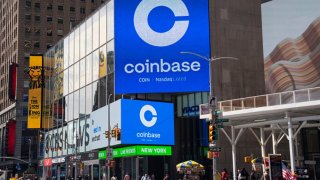 NEW YORK, NY – APRIL 14: Monitors display Coinbase signage during the company’s initial public offering (IPO) at the Nasdaq market site April 14, 2021 in New York City. Coinbase Global Inc. is the largest U.S. cryptocurrency exchange, debuting today through a rare direct listing.  (Photo by Robert Nickelsberg/Getty Images)