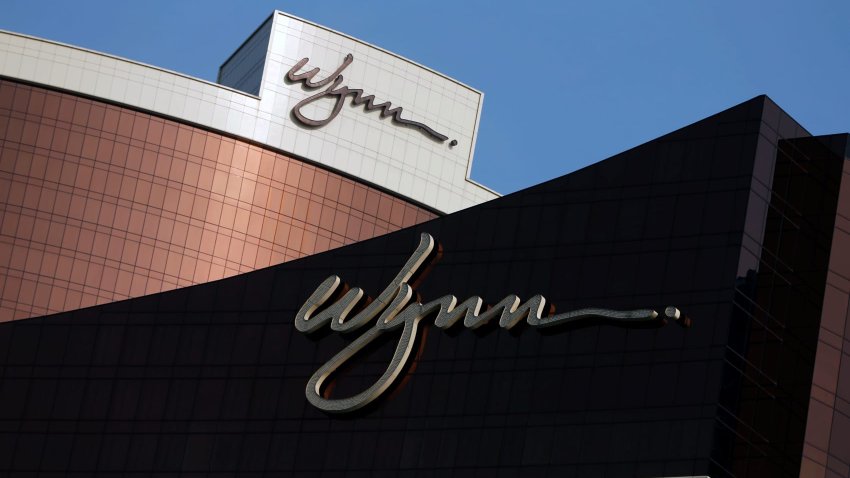 File: ompany logos are displayed at Wynn Macau resort in Macau, China