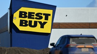 Logo of Best Buy displayed outside a Best Buy store in Edmonton, Alberta, Canada, on March 22, 2025.