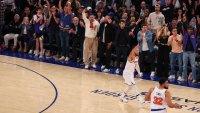 Jalen Brunson of the New York Knicks celebrates a three-point basket