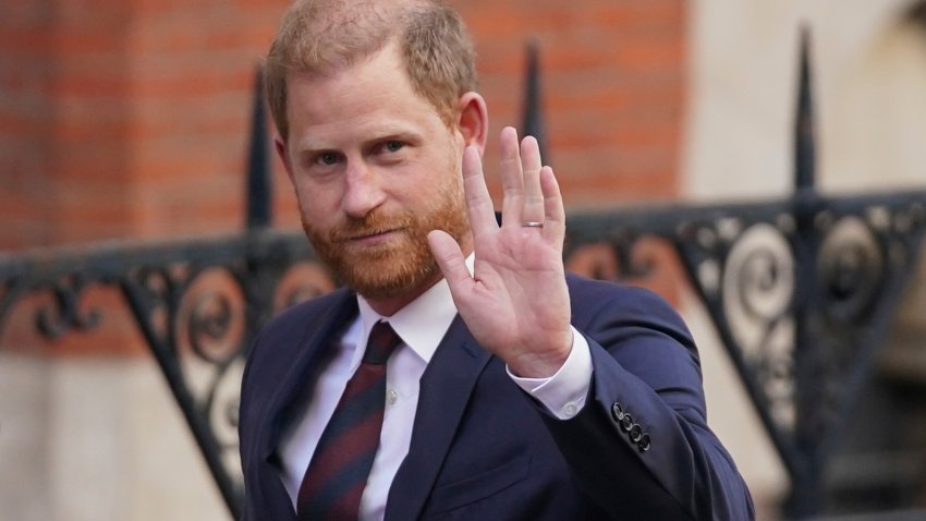 Prince Harry waves as he leaves the Royal Courts of Justice in London, Wednesday, April 9, 2025.