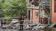 Army soldiers stand guard at a mosque building damaged by a suspected Indian missile attack near Muzaffarabad, the capital of Pakistan controlled Kashmir, on Wednesday, May 7, 2025. (AP Photo/M.D. Mughal)