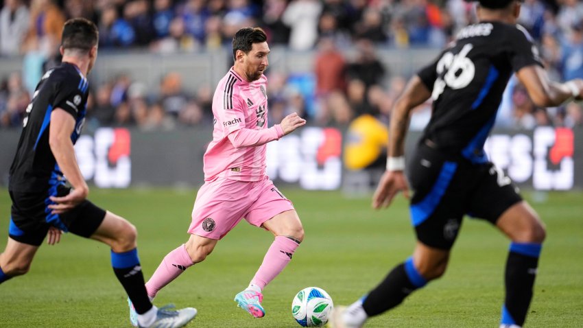 Inter Miami midfielder Lionel Messi, center, moves the ball during the first half of an MLS soccer match against the San Jose Earthquakes, Wednesday, May 14, 2025, in San Jose, Calif. (AP Photo/Godofredo A. Vásquez)