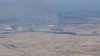 Crews battle brush fire outside Tracy