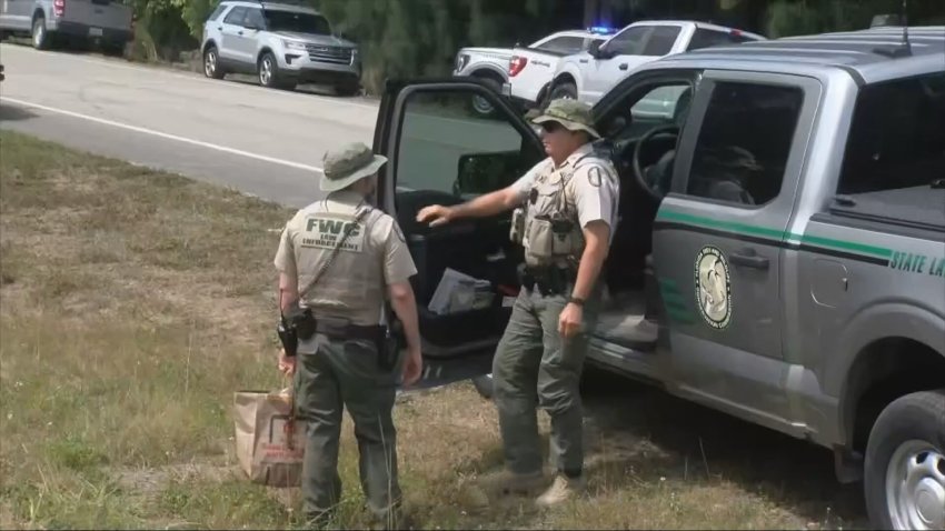 Authorities investigate a fatal bear attack in Collier County, Florida, on Monday.