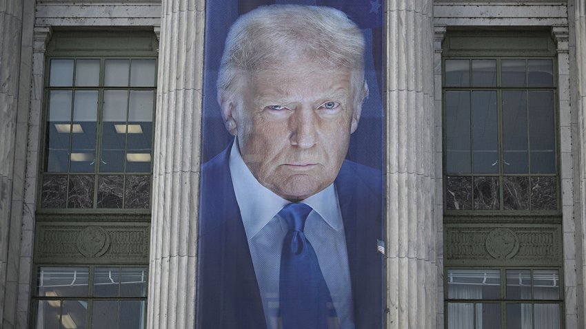 A banner showing an image of Donald Trump hangs on the side of a U.S. Department of Agriculture building in Washington, D.C., on May 16, 2025. The banner was put up to mark the the 163rd anniversary of the Department of Agriculture which was founded on May 15, 1862, by Abraham Lincoln.