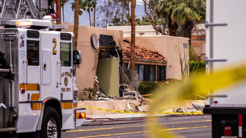 The side of American Reproductive Centers clinic is seen after an explosion being investigated by law enforcement as an intentional act of violence in Palm Springs, Calif., Saturday, May 17, 2025.
