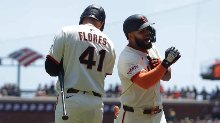 SAN FRANCISCO, CA – MAY 18: San Francisco Giants Heliot Ramos (17) celebrates a home run with Wilmer Flores (41) in the first inning against the Athletics on May 18, 2025, at Oracle Park in San Francisco, CA. (Photo by Ben Warden/Icon Sportswire via Getty Images)