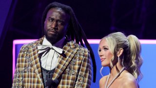 Shaboozey (L) and Megan Moroney present the Favorite Country Duo or Group award onstage during the 2025 American Music Awards at BleauLive Theater at Fontainebleau Las Vegas on May 26, 2025 in Las Vegas, Nevada.