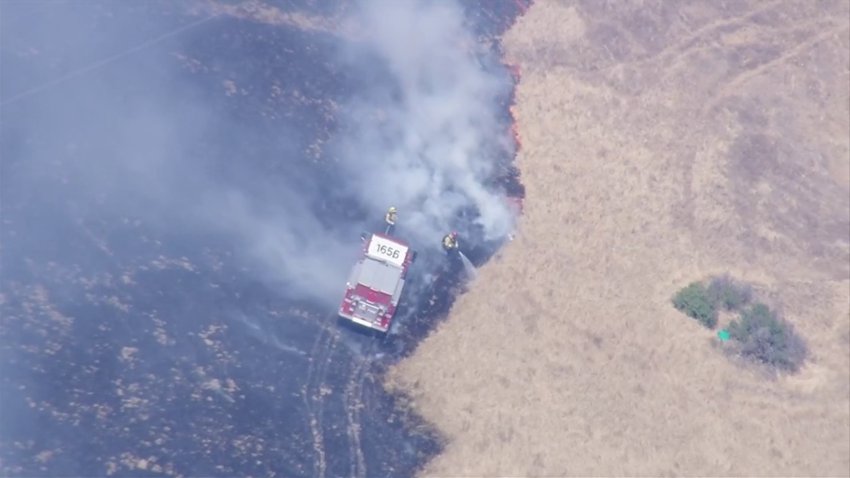 Firefighters battle a blaze in Sunol. (June 16, 2025)