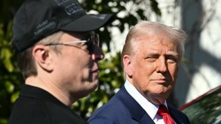 US President Donald Trump and Tesla CEO Elon Musk speak to the press as they stand next to a Tesla vehicle on the South Portico of the White House on March 11, 2025 in Washington, DC.