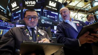 Traders work on the floor at the New York Stock Exchange (NYSE), on the day of Circle Internet Group’s IPO, in New York City, U.S., June 5, 2025.