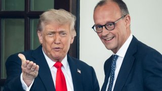 President Donald Trump gestures toward the press as he greets German Chancellor Friedrich Merz upon arrival at the West Wing of the White House in Washington, DC, on June 5, 2025.