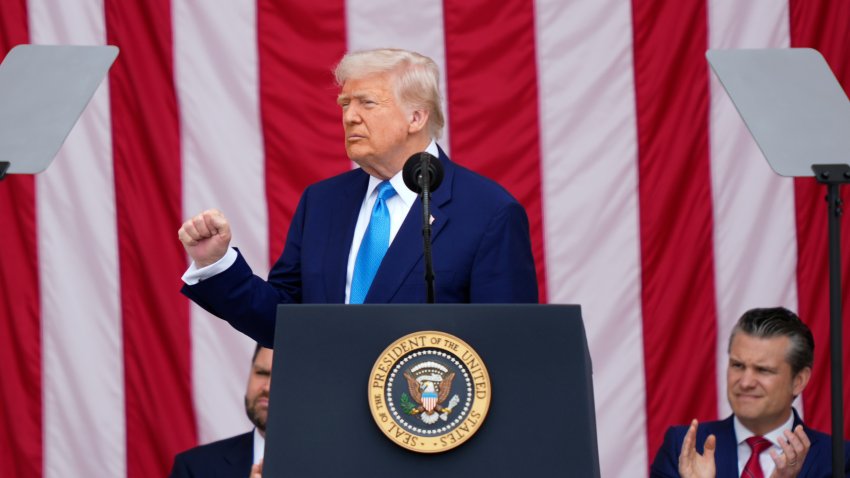 President Donald Trump delivers the Memorial Day Address at the 157th National Memorial Day Observance at Arlington National Cemetery, Monday, May 26, 2025, in Arlington, Va., as Vice President JD Vance and Secretary of Defense Pete Hegseth, right, look on. (AP Photo/Julia Demaree Nikhinson)