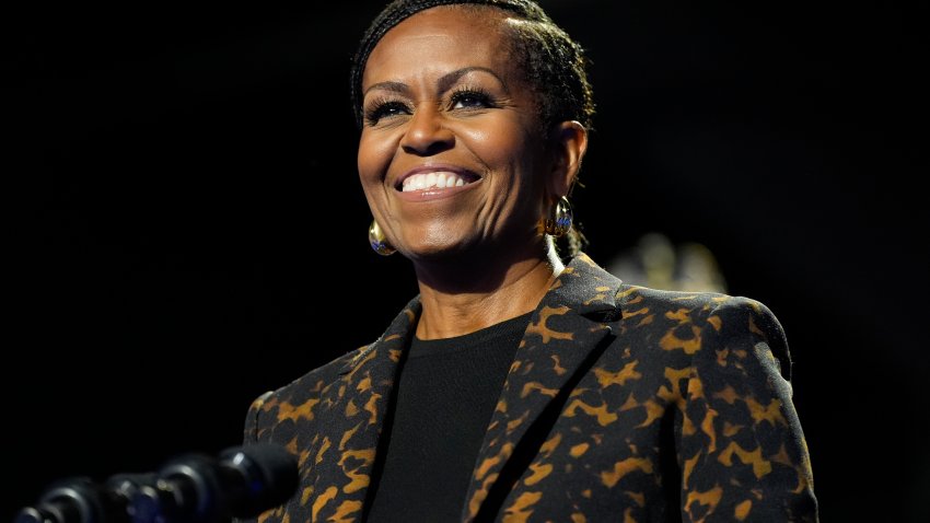 FILE – Former first lady Michelle Obama speaks at a campaign rally for democratic presidential nominee Vice President Kamala Harris in Kalamazoo, Mich., on Oct. 26, 2024.