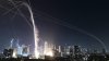Israel targets Iran's Defense Ministry headquarters as Tehran unleashes deadly missile strike