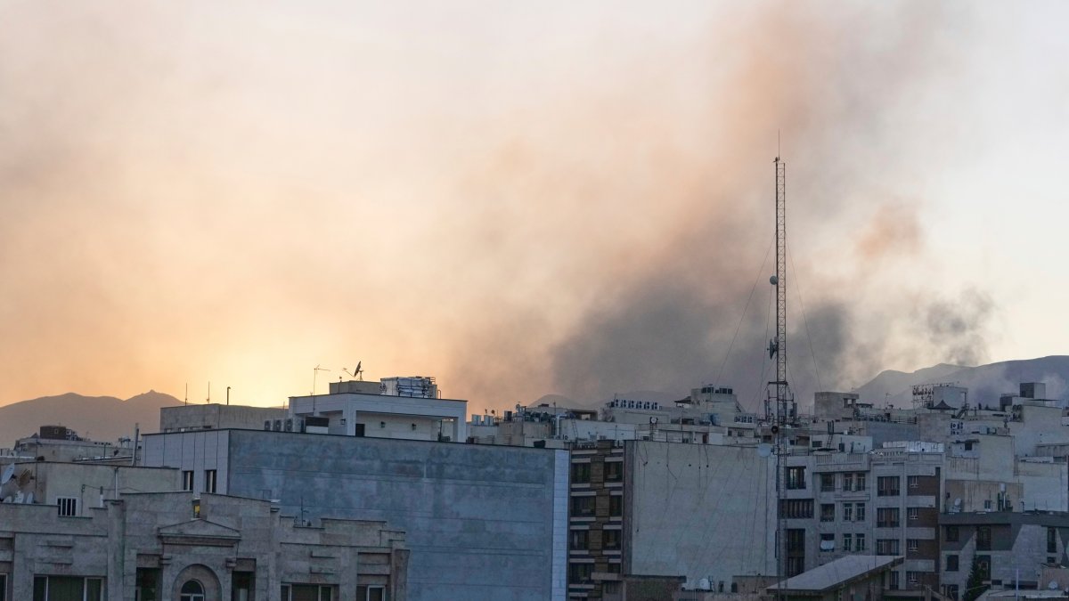 Dozens wounded in Iranian strikes across Israel, as Israel hits Arak reactor site