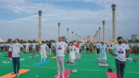 Indians perform yoga