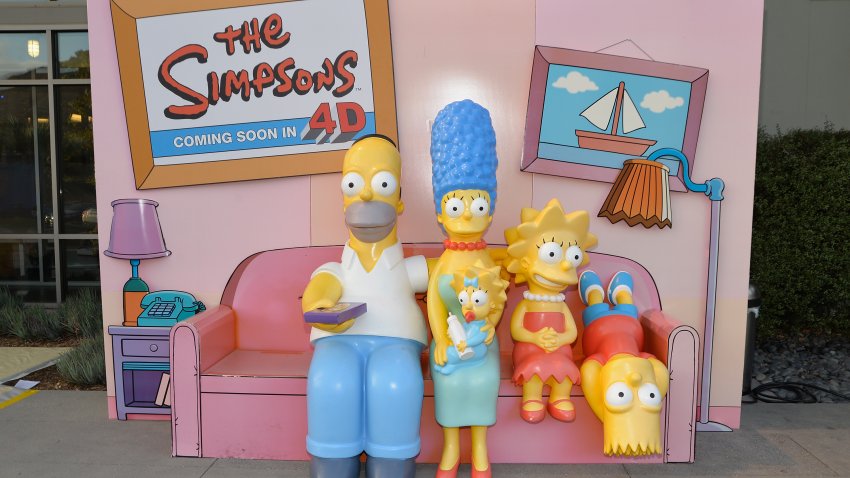 File.  Shot of a statue of Homer Simpson, Marge Simpson, Maggie Simpson, Lisa Simpson and Bart Simpson at a celebration of the 600th Episode of “The Simpsons” at YouTube Space LA on October 14, 2016 in Los Angeles, California.