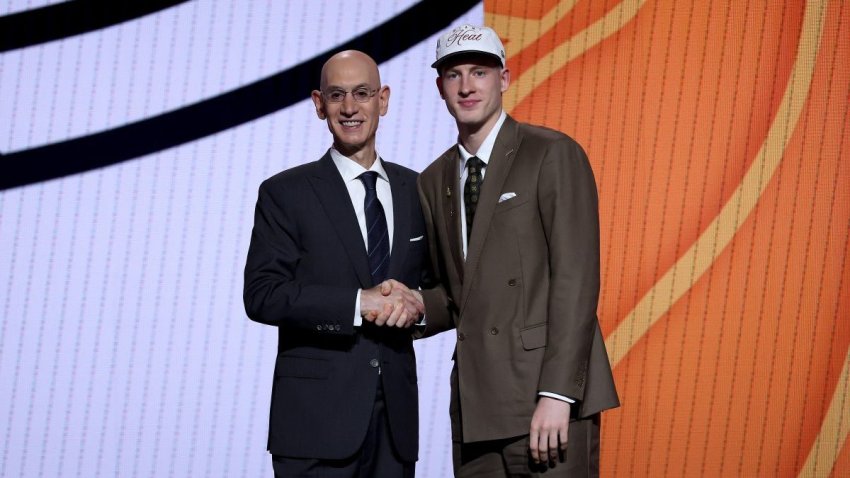 NEW YORK, NEW YORK – JUNE 25: Kasparas Jakučionis (R) shakes hands with NBA commissioner Adam Silver (L) after being drafted twentieth overall by the Miami Heat during the first round of the 2025 NBA Draft at Barclays Center on June 25, 2025 in the Brooklyn borough of New York City. NOTE TO USER: User expressly acknowledges and agrees that, by downloading and/or using this photograph, user is consenting to the terms and conditions of the Getty Images License Agreement. (Photo by Sarah Stier/Getty Images)