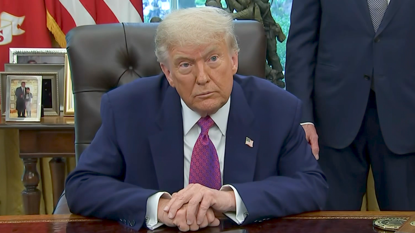 Trump sits in Oval Office