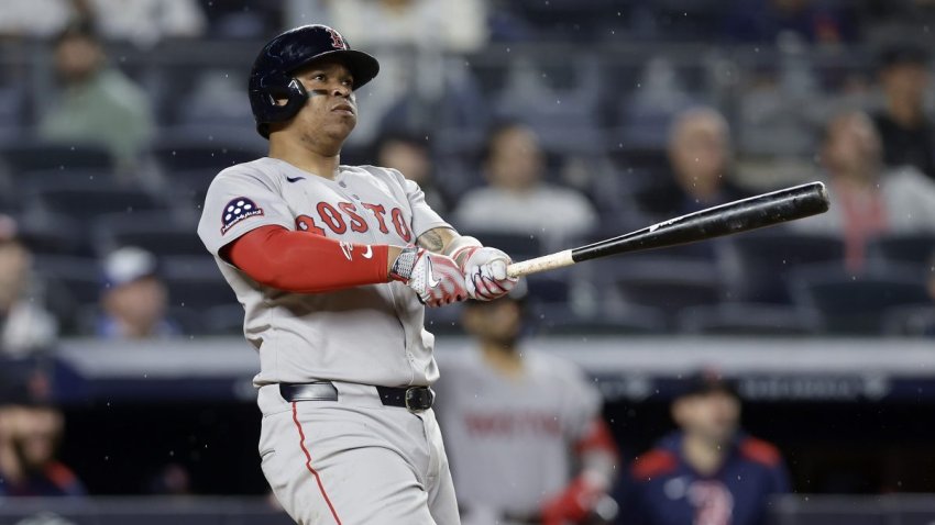 NEW YORK, NEW YORK – JUNE 08: Rafael Devers #11 of the Boston Red Sox follows through on his ninth inning home run against the New York Yankees at Yankee Stadium on June 08, 2025 in New York City. The Red Sox defeated the Yankees 11-7. (Photo by Jim McIsaac/Getty Images)