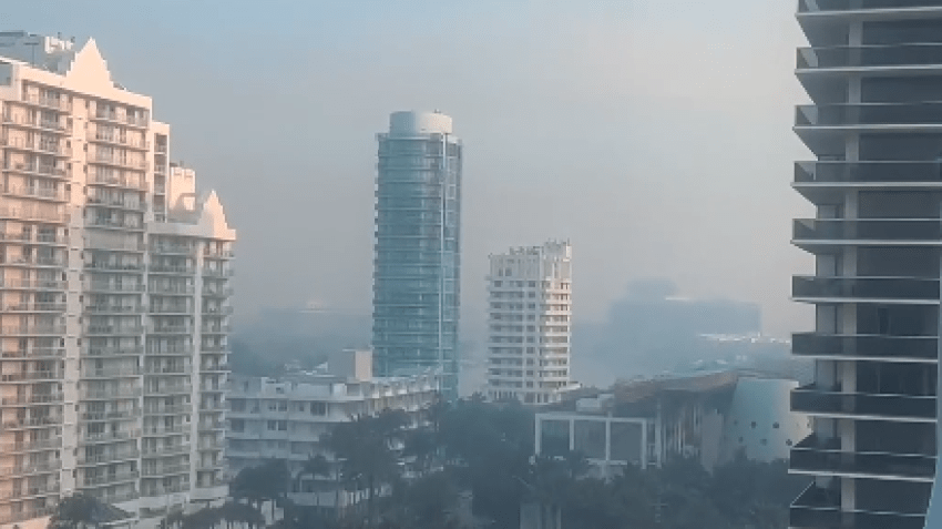 Smoke from a wildfire burning in the Everglades can be seen from Miami Beach on Aug. 20, 2025.