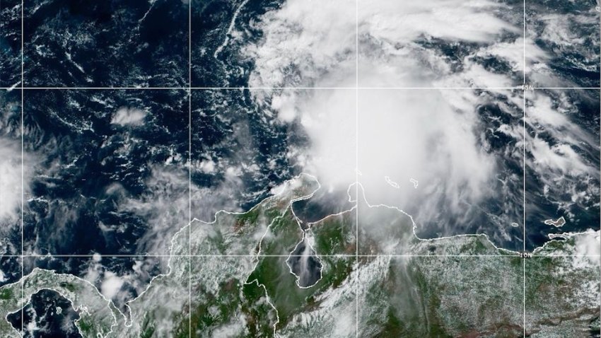 This NOAA satellite image taken at 11:40 a.m. EST on Tuesday, Oct. 21, 2025, shows Tropical Storm Melissa in the Central Caribbean Sea.