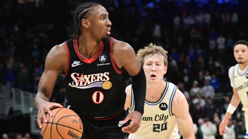 Tyrese Maxey dribbles