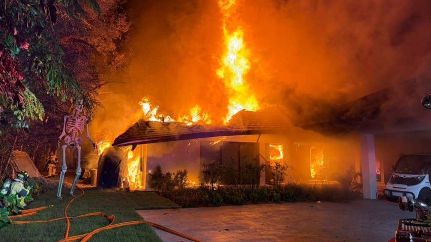 Video shows crews battling a massive fire at a home registered to Miami Heat head coach Erik Spoelstra in Miami-Dade, Florida, on Thursday.