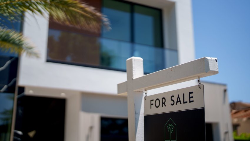 A "For Sale" sign in front of a home in the Encino neighborhood of Los Angeles, California
