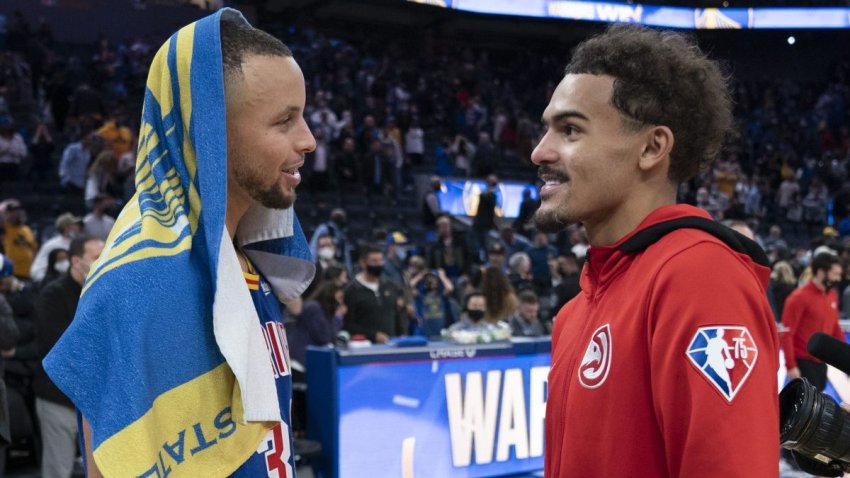 November 8, 2021; San Francisco, California, USA; Golden State Warriors guard Stephen Curry (30) and Atlanta Hawks guard Trae Young (11) talk after the game at Chase Center. Mandatory Credit: Kyle Terada-USA TODAY Sports