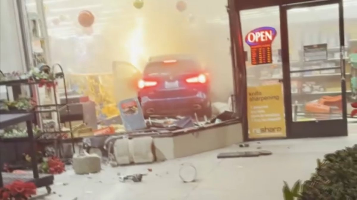 Car catches fire after crashing into hardware store in Redwood City