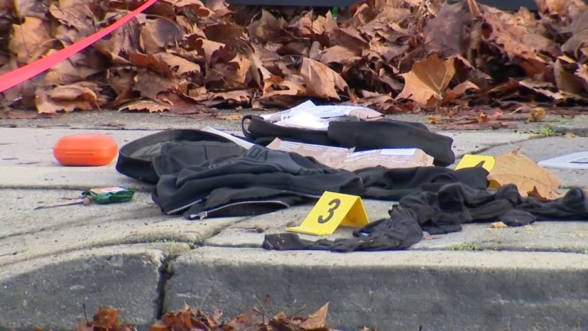 Evidence markers and clothing at the scene of a shooting in San Jose. (Dec. 26, 2025)