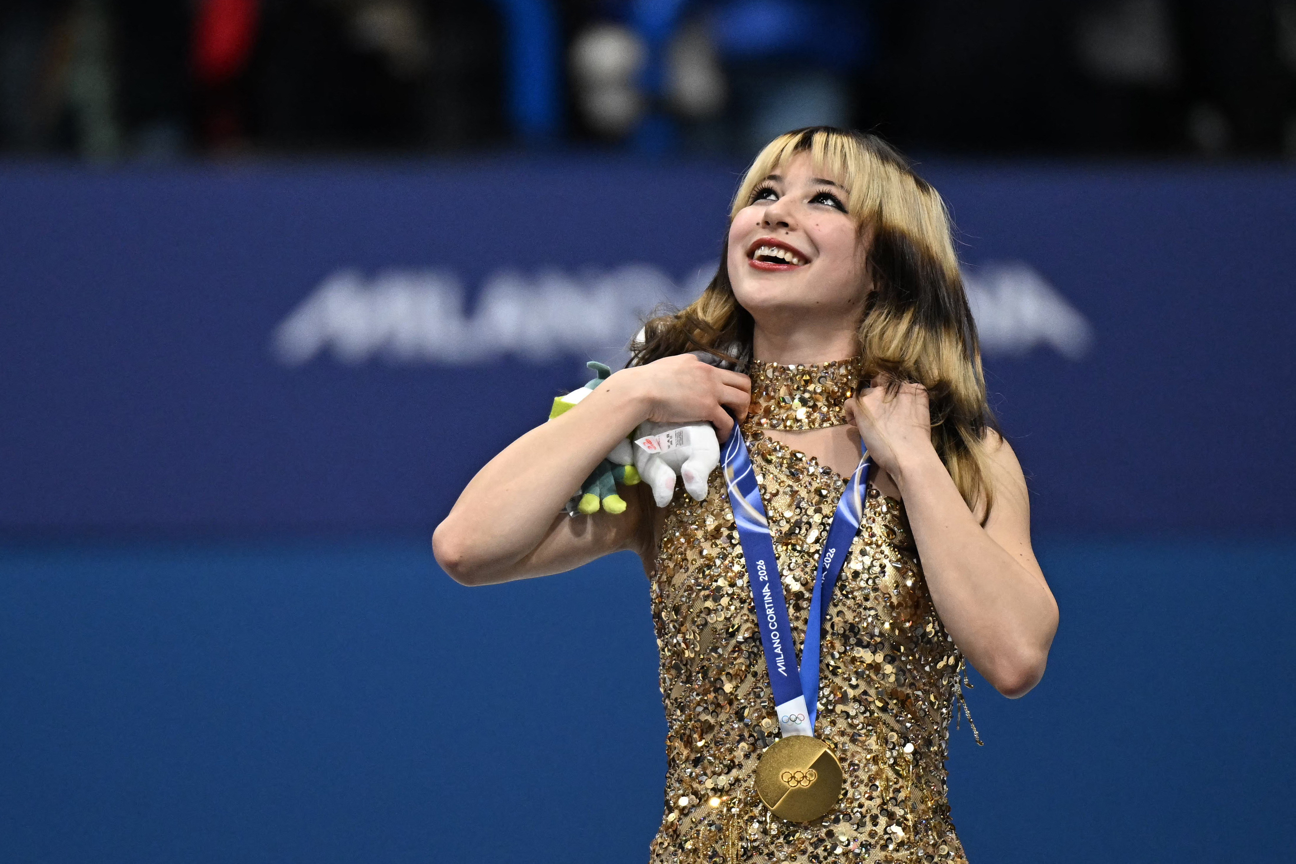 Alysa Liu earns first U.S. women's figure skating gold since 2002 in a nail-biter