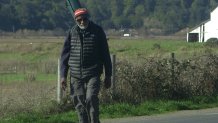John Francis walks through Point Reyes Station in western Marin County, where his walking pilgrimage began.