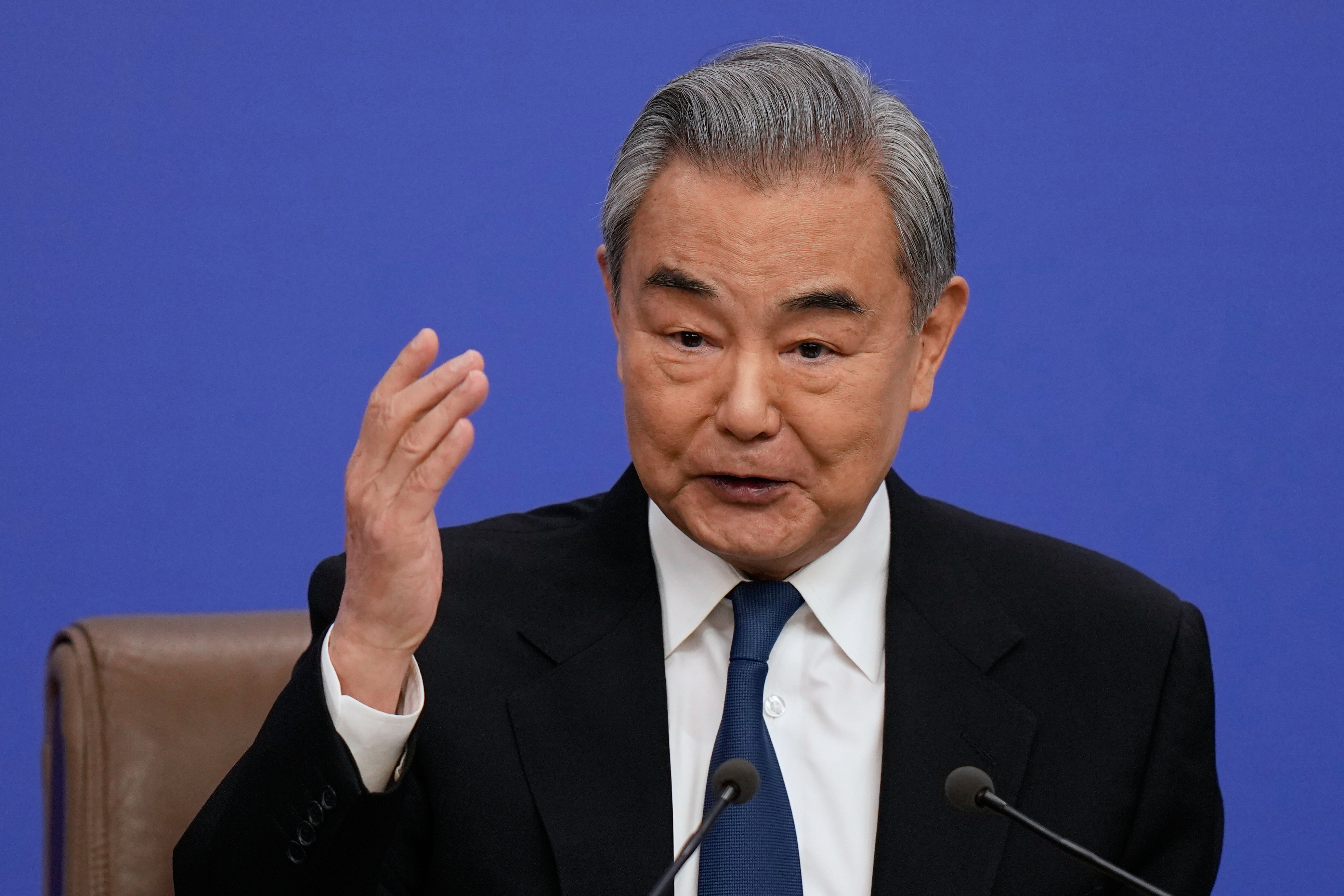 Chinese Foreign Minister Wang Yi speaks during a press conference on the sideline of the National People’s Congress (NPC) at the media center, in Beijing, Sunday, March 8, 2026.