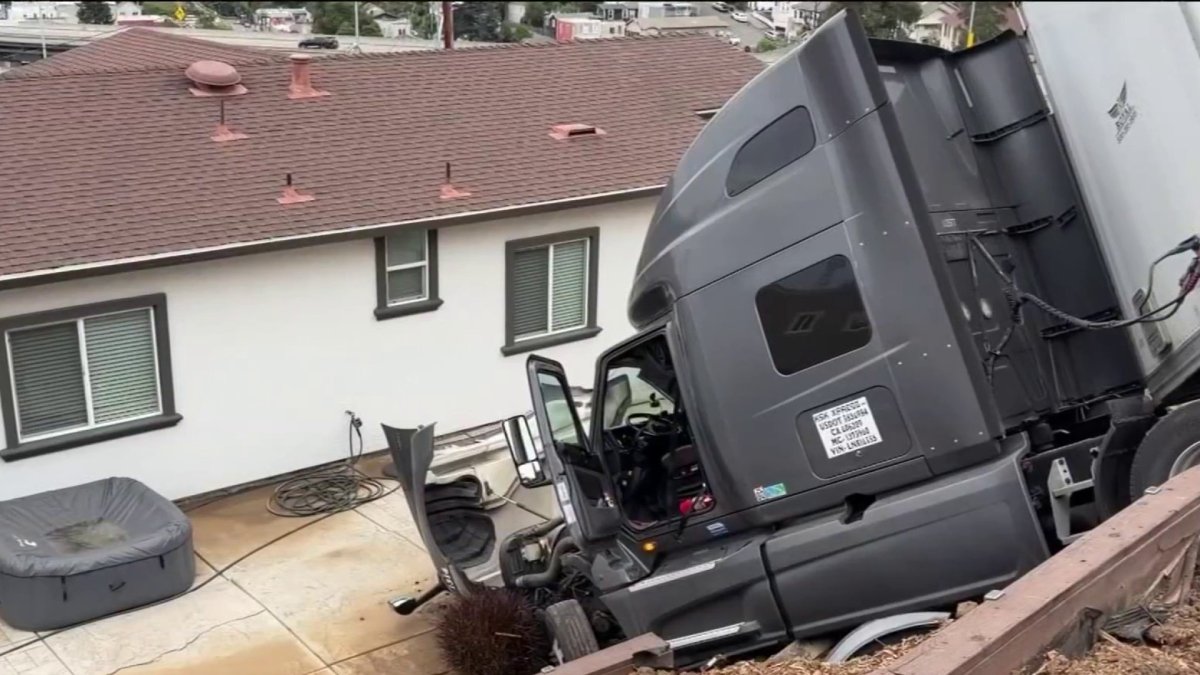 Big rig removed after crashing into backyard in Crockett