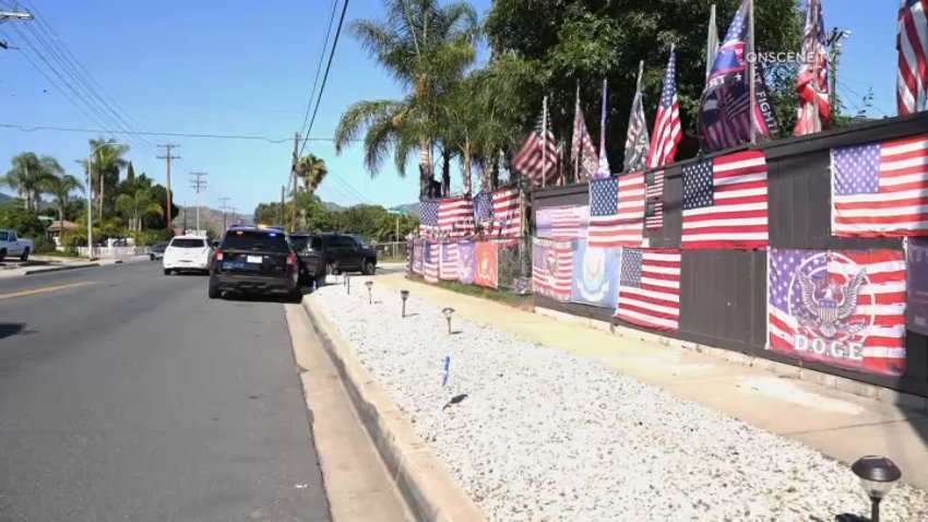 A home in Escondido known for it's Trump-themed memorabilia and American Flags.