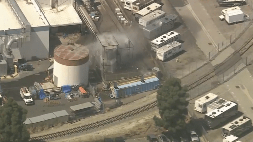 Water is sprayed on a volatile chemical tank Friday May 22, 2026 in Garden Grove.