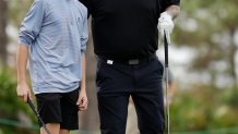 Carson Daly and his son Jackson Daly at a golf event