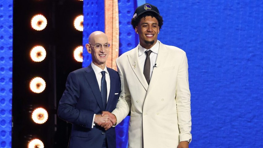 NEW YORK, NEW YORK – JUNE 23:  NBA commissioner Adam Silver shakes hands with Yaxel Lendeborg after is drafted eleventh overall by the Golden State Warriors during Round One of the 2026 NBA Draft at Barclays Center on June 23, 2026 in New York City.  (Photo by Arturo Holmes/Getty Images)