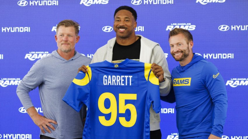 WOODLAND HILLS, CA – JUNE 02, 2026: General manager Les Snead, Myles Garrett and head coach Sean McVay of the Los Angeles Rams pose for a photo during a press conference at Rams training facility on Tuesday, June 2, 2026 in Woodland Hills, CA.  (Ric Tapia / Los Angeles Times via Getty Images)